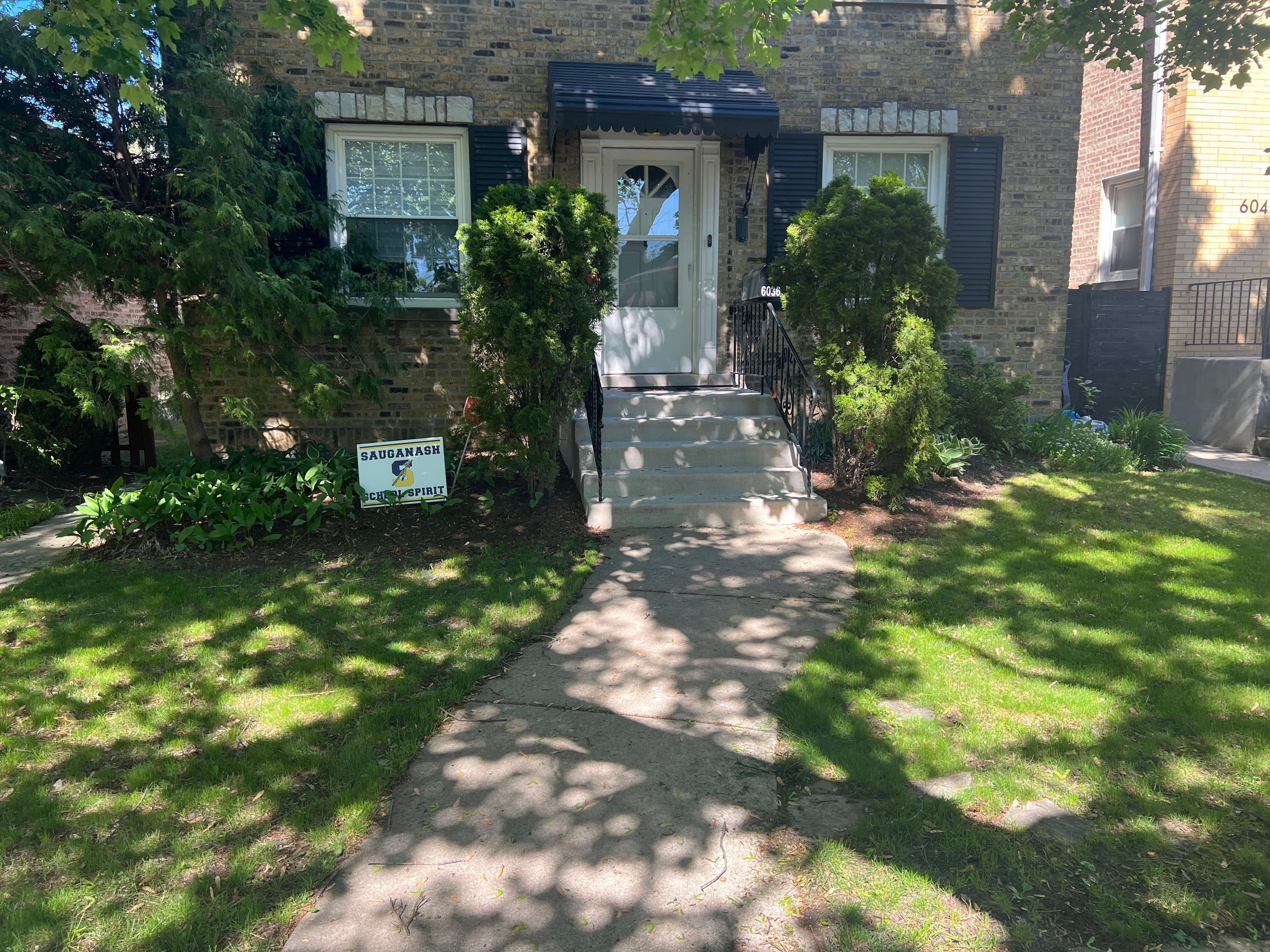 Project Front Yard Curb Appeal Upgrade with New Trees and Black Mulch image